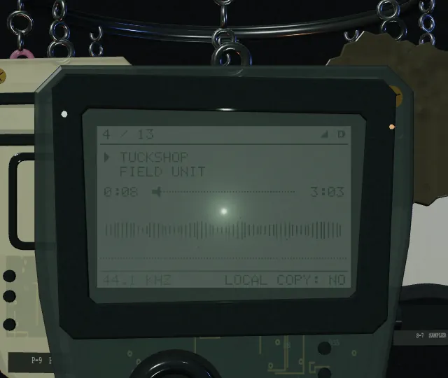 The RO-404's screen playing Tuckshop by Field Unit: elapsed and total time, a position bar and a waveform drawn from the audio.